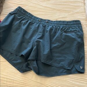 Vuori Women's Teal Athletic Shorts with Zippered Pocket